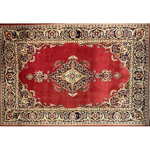 138 - A Kashan rug / carpet, 220cm x 130cm.