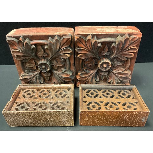 150 - A pair of Victorian terracotta  brick tiles, moulded with floral decoration, approx 26cm square;  tw... 