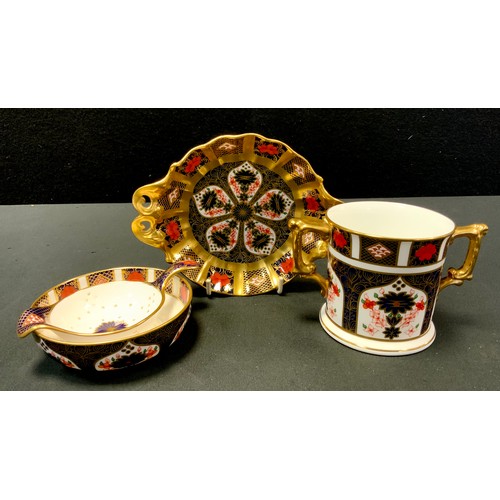 177 - A Royal Crown Derby 1128 twin handle loving cup, tea strainer and stand,  pedestal bowl, all firsts,... 