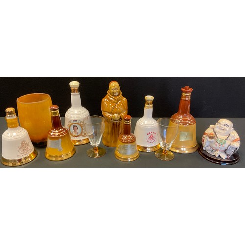 185 - Bell's Scotch Whisky bottle, full, 50cl;  another;  others, empty;  a jolly Buddha;  etc