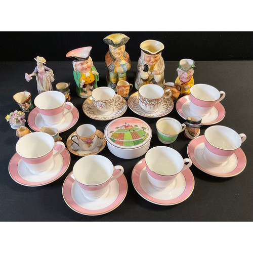 198 - A  Royal Doulton tea service, banded in pink, printed marks (seconds);  other tea ware;  character a... 