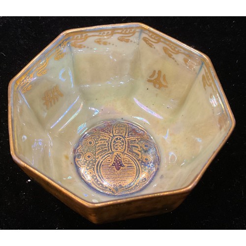 35 - A Wedgwood Fairyland lustre octagonal bowl, the interior painted with a spider, 7cm diameter