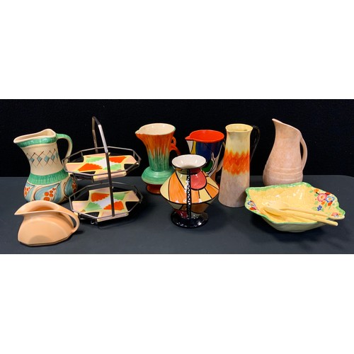 243 - A Lorna Bailey Sunburst pattern vase; Art Deco and other jugs, inc Wade, Myott, Sadler, Crown Devon ... 