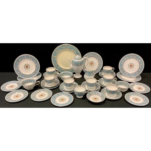 246 - A Wedgwood Florentine pattern tea set, for eight, cups, saucers, coffee pot, two soup bowls, bread p... 