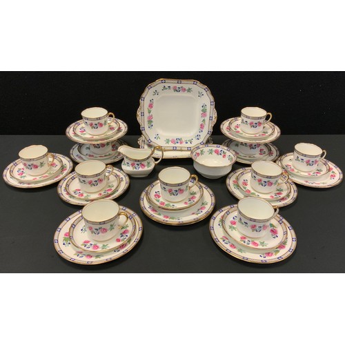 248 - An early 20th century Aynsley tea set, for twelve, decorated with flowers in tones of blue, pink, gr... 