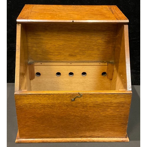 43 - An Edwardian light oak slope front stationery box, hinged cover, unfitted, 29cm high, 30cm wide