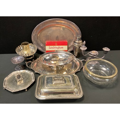 250 - Plated Ware - an EPNS entrée dish and cover;  candelabrum;  two handled tray;  cocktail shaker;  etc