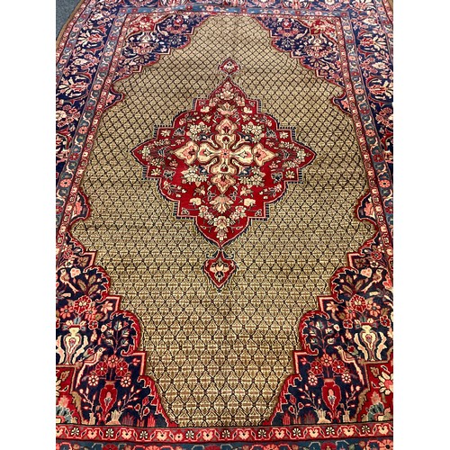 290 - A large Moud rug / carpet, 325cm x 215cm.