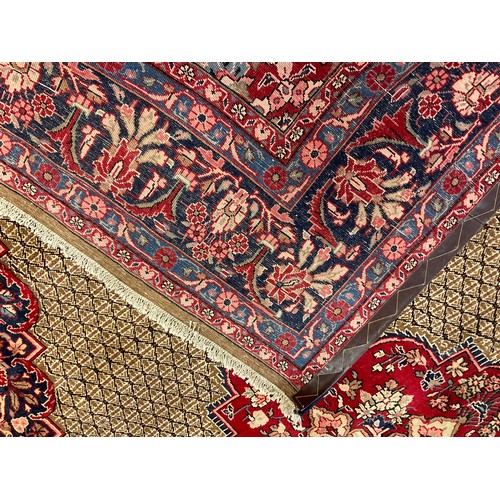 290 - A large Moud rug / carpet, 325cm x 215cm.