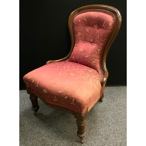 298 - A Victorian mahogany spoon back nursing chair, c.1850