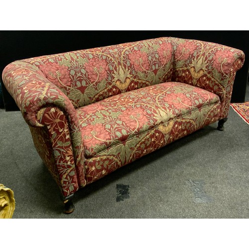 307 - A Victorian two-seat chesterfield sofa, scroll arms, upholstered in a William Morris pattern Liberty... 