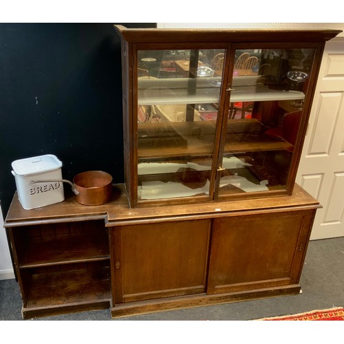 147 - A large Victorian oak workshop/scullery/Kitchen cabinet, the mirrored back two door glazed top, 121c... 