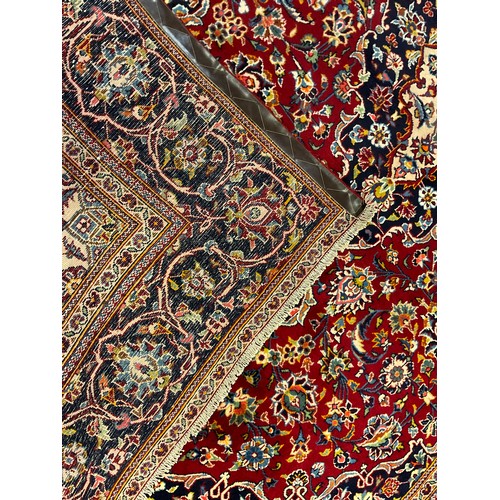 330 - A large Kashan carpet, 300cm x 192cm.