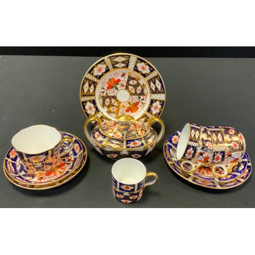 207 - A Royal Crown Derby 2451 pattern twin handled oval sucrier and cover, two side plates, three cups an... 