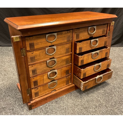 118A - An early 20th century American Amberg’s patent mahogany ten drawer filing cabinet, 66cm tall x 87.5c... 