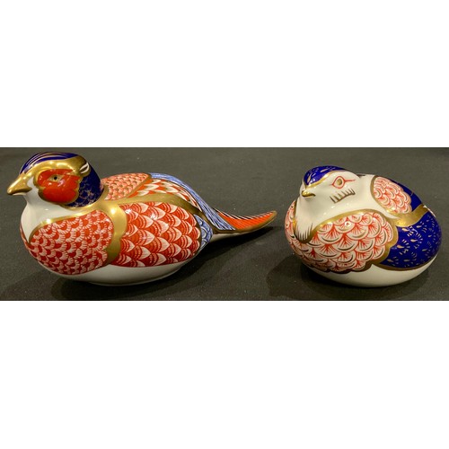 141 - A Royal Crown Derby paperweight, Pheasant, original solid stopper; Quail, original solid stopper (2)