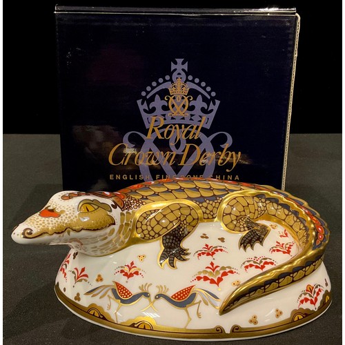 142 - A Royal Crown Derby paperweight, Crocodile, gold stopper, boxed