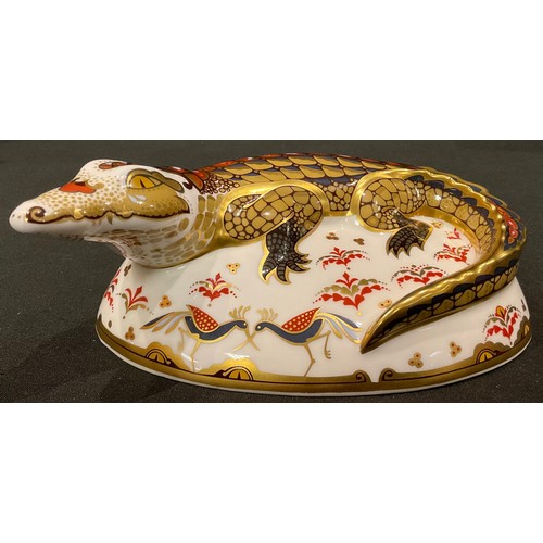 142 - A Royal Crown Derby paperweight, Crocodile, gold stopper, boxed