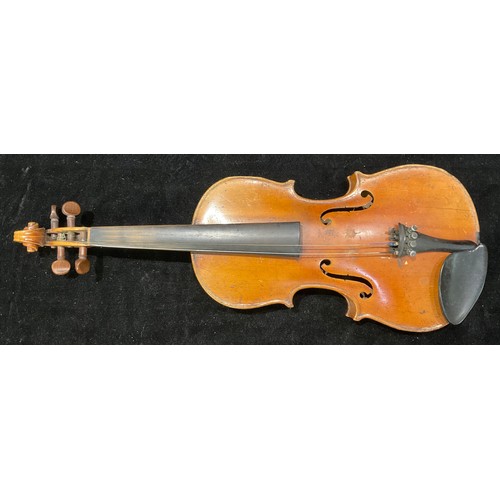 243 - A violin, the two-piece back 31.5cm excluding button, 52cm long overall