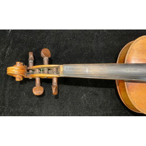 243 - A violin, the two-piece back 31.5cm excluding button, 52cm long overall