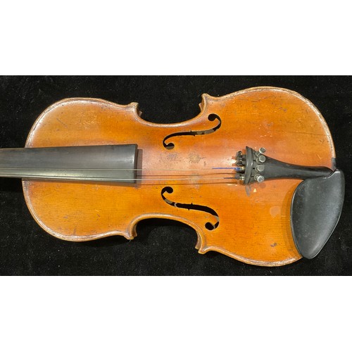 243 - A violin, the two-piece back 31.5cm excluding button, 52cm long overall