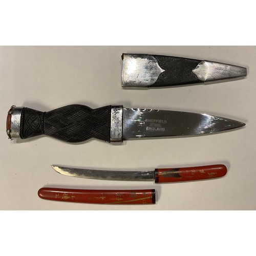 245 - A miniature Japanese lacquer sword; a Scottish Dirk (2)