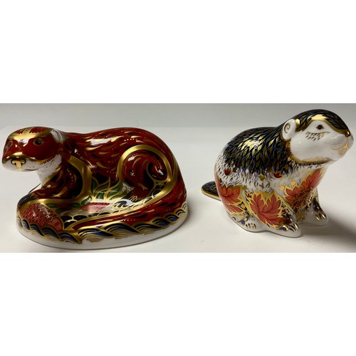 231 - A Royal Crown Derby paperweight, Otter, Guild of China & Glass Retailers gold signature limited edit... 