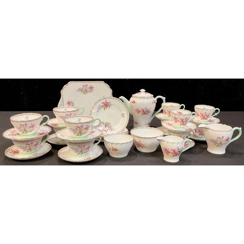 355 - A composed Shelley Henley shape tea and coffee set comprising, coffee pot, cream jug and sugar bowl,... 