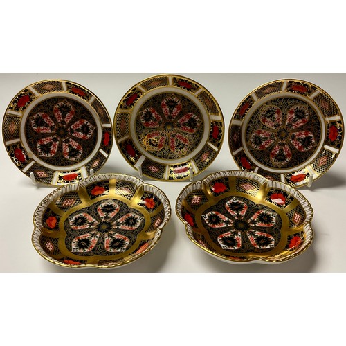 240 - A pair of Royal Crown Derby Imari palette 1128 pattern five petal trinket trays; a group of three 11... 