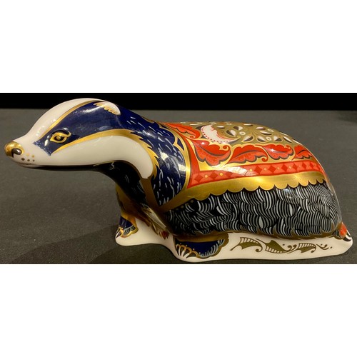 361 - A Royal Crown Derby paperweight, Moonlight Badger, Collector's Guild Exclusive, 21st anniversary gol... 