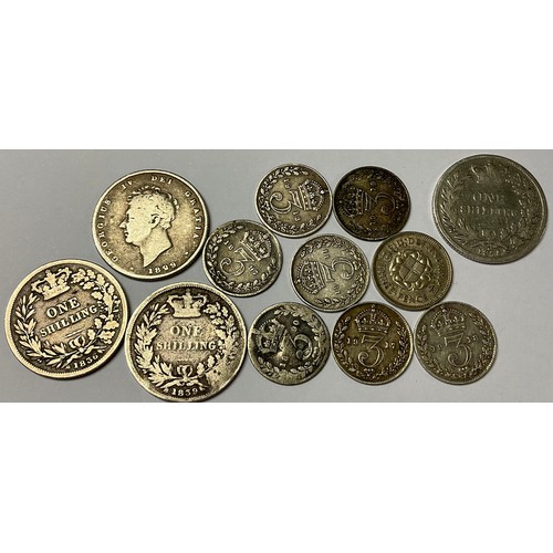 428 - Coins - a Victorian silver shilling 1875; a George IV silver shilling 1829; a William IIII silver sh... 