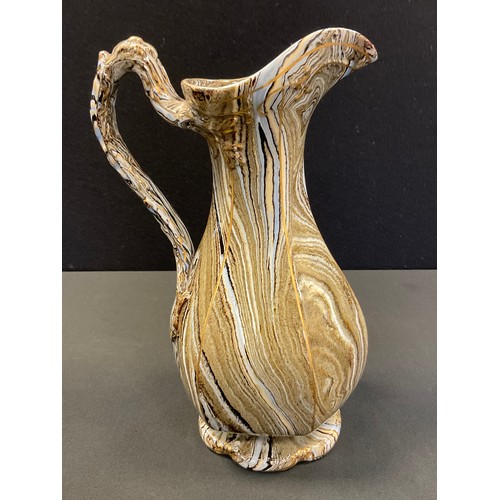 210 - A Victorian Staffordshire Agateware marbled panelled jug, scalloped foot, divided loop handle,  29cm... 