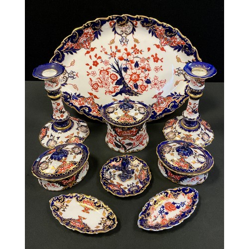 208 - A Royal Crown Derby 383 'Scissor' pattern dressing table set, comprising oval tray, two oval lidded ... 