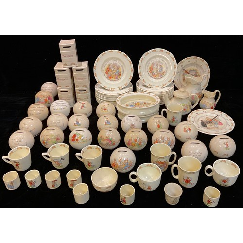 477 - A large collection of Royal Doulton Bunnykins nursery ware, cups, mugs, money banks, plates, etc