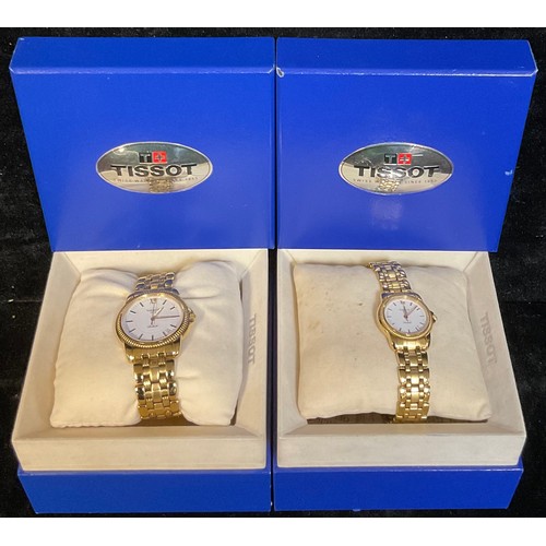 492 - A pair of Tissot gold plated stainless steel watches, a lady's and a gentleman's, analogue quartz, w... 