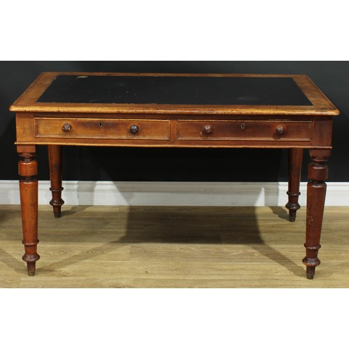 303 - A Victorian mahogany writing table, 70cm high, 122cm wide, 76cm deep