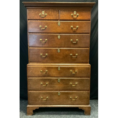 159 - A George III oak chest on chest, dental cornice, above pair of two short and three long graduated dr... 