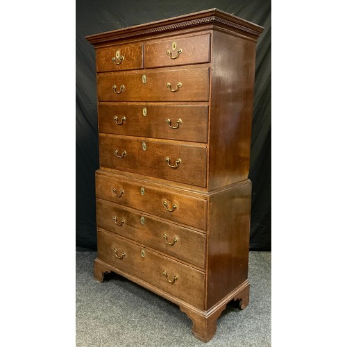 159 - A George III oak chest on chest, dental cornice, above pair of two short and three long graduated dr... 