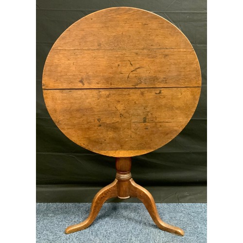 160 - A 19th century oak tilt-top pedestal table, circular top, turned column, 67cm high, 77cm diam, c.180... 