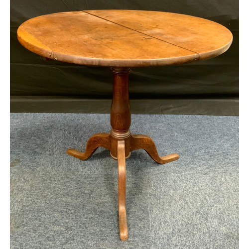 160 - A 19th century oak tilt-top pedestal table, circular top, turned column, 67cm high, 77cm diam, c.180... 