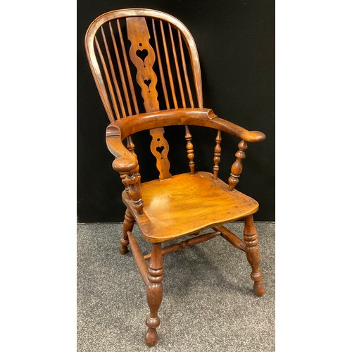 151 - An 18th century elm and ash high back Windsor chair, heart pierced splat, scroll arms, H stretcher, ... 