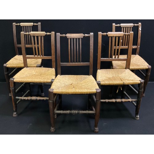 112 - A set of five 19th century oak and elm dining chairs, rush seats. turned stretchers, c.1840