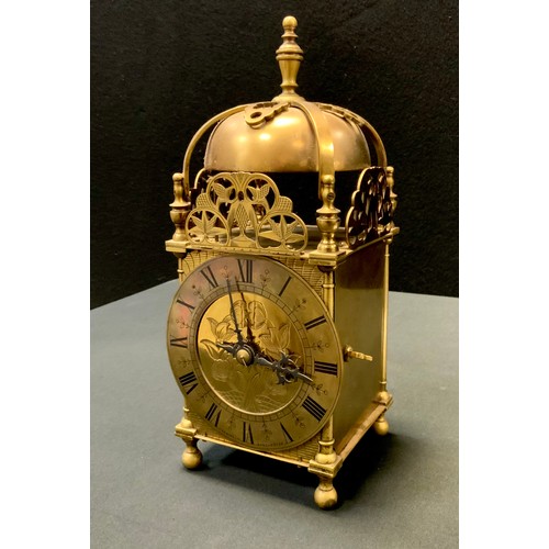 173 - A 17th century style brass lantern clock, retailed by Finnigan's, Manchester, 30cm high