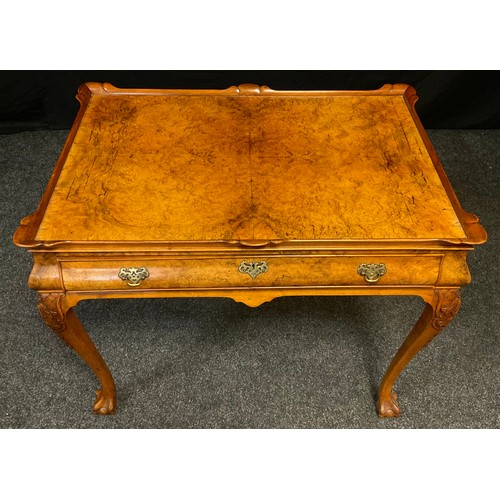 240 - A 19th century style, reproduction burr walnut ‘silver table’ / lowboy, for Hille of London, dish to... 