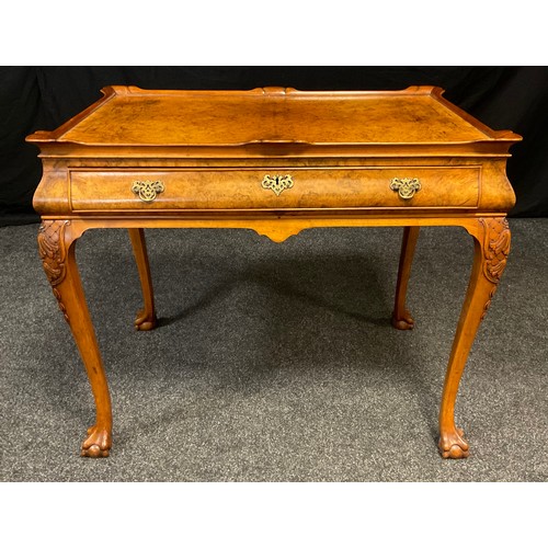 240 - A 19th century style, reproduction burr walnut ‘silver table’ / lowboy, for Hille of London, dish to... 