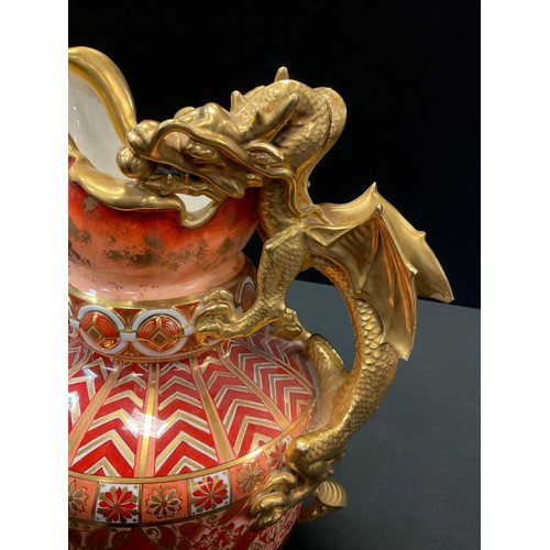 211 - A large Copeland Spode double dragon jug, decorated in iron red,  orange and gilt with stylised flor... 