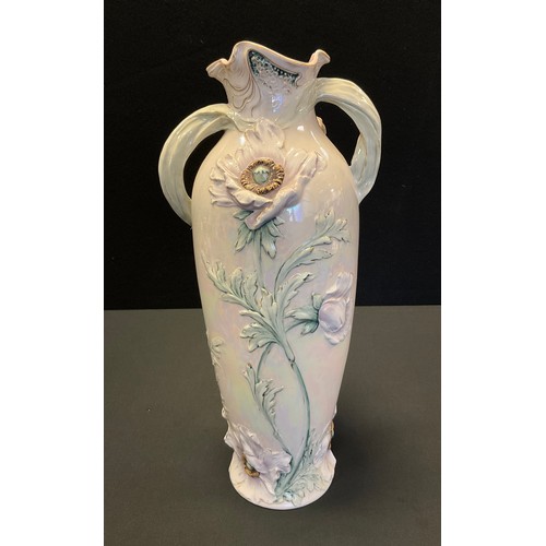 27 - A Royal Dux Art Nouveau two handle vase, in relief with a musician holding a triangle, the verso wit... 