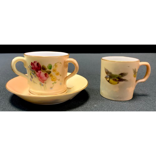 143 - A Royal Worcester miniature coffee cup and saucer, decorated  with British birds in flight on a blus... 