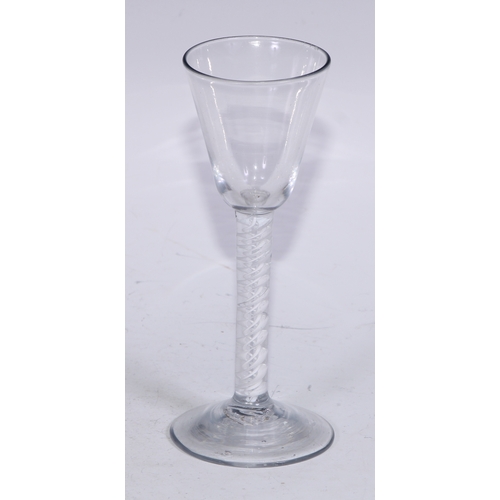 7 - A George III opaque twist wine glass, conical bowl, double-helix stem, domed foot, 15cm high, c.1765