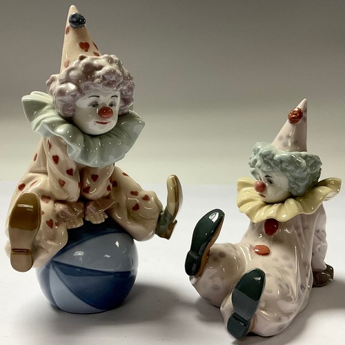 10 - A Lladro model of a clown, Having A Ball, 17cm, number 010.05813, boxed; another, Tired Friend, numb... 